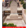 beige cross granite tombstone